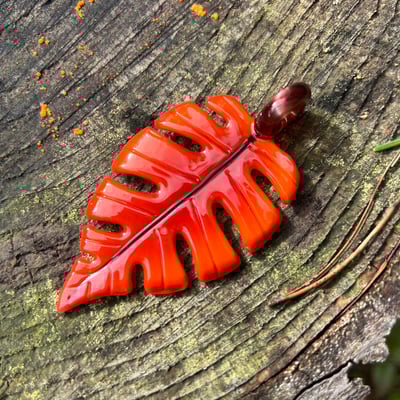Image of Orange Sunburst Monstera Leaf Pendant