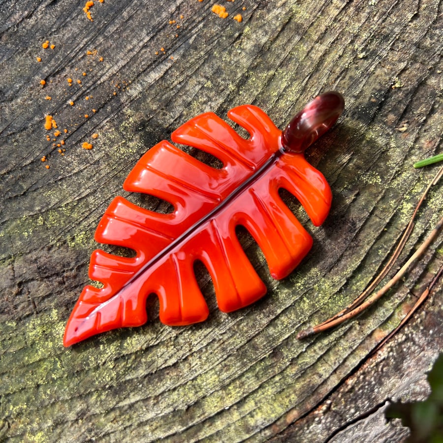 Image of Orange Sunburst Monstera Leaf Pendant