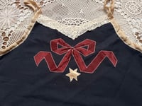 Image 2 of black with red bow
