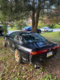 Image 4 of Annoying Team Racing! Rear windshield banner