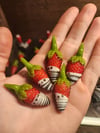 Micro berry dipped in white chocolate drizzle with milk chocolate 