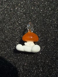 Image 1 of Tiny orange mushroom character 