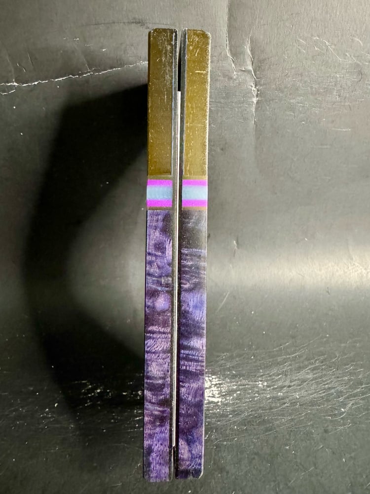 Image of @Kaoticartworks 3-D Resin & Amboyna Burl GLOW Segmented Knife Scales