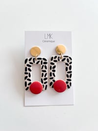 Paire de boucles d'oreilles céramique ARCHI PERCA + 1