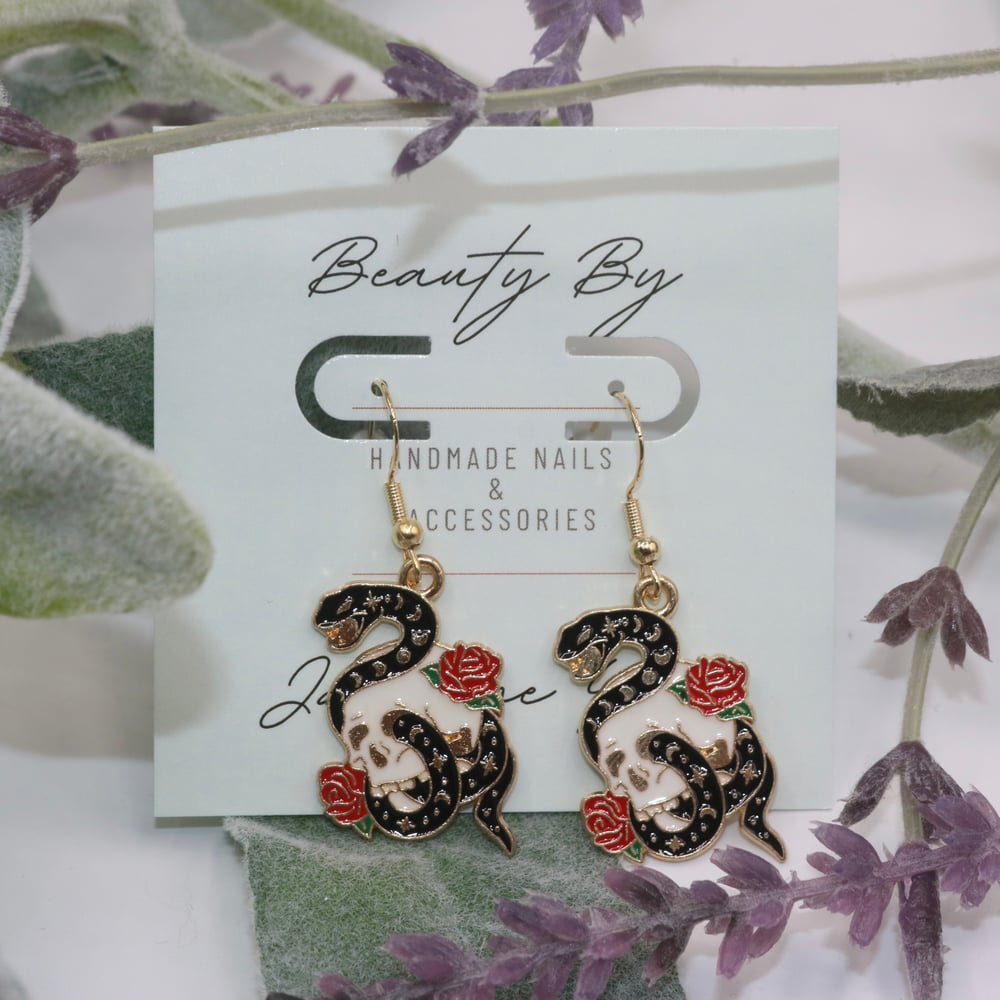 Image of Snake Skull Earrings