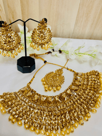 Image 5 of Golden Dust Bridal Kundan Set (necklace, earrings, tika)