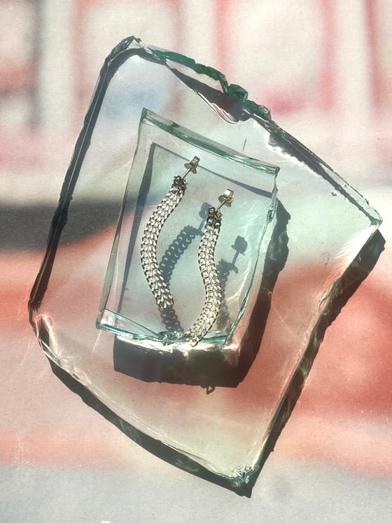 Image of WOVEN EARPIECES