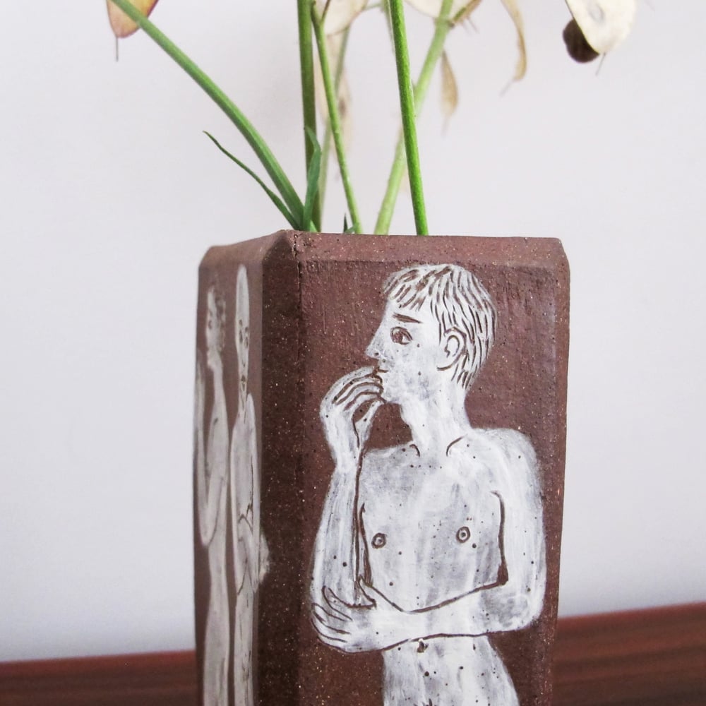 Naked men flower brick