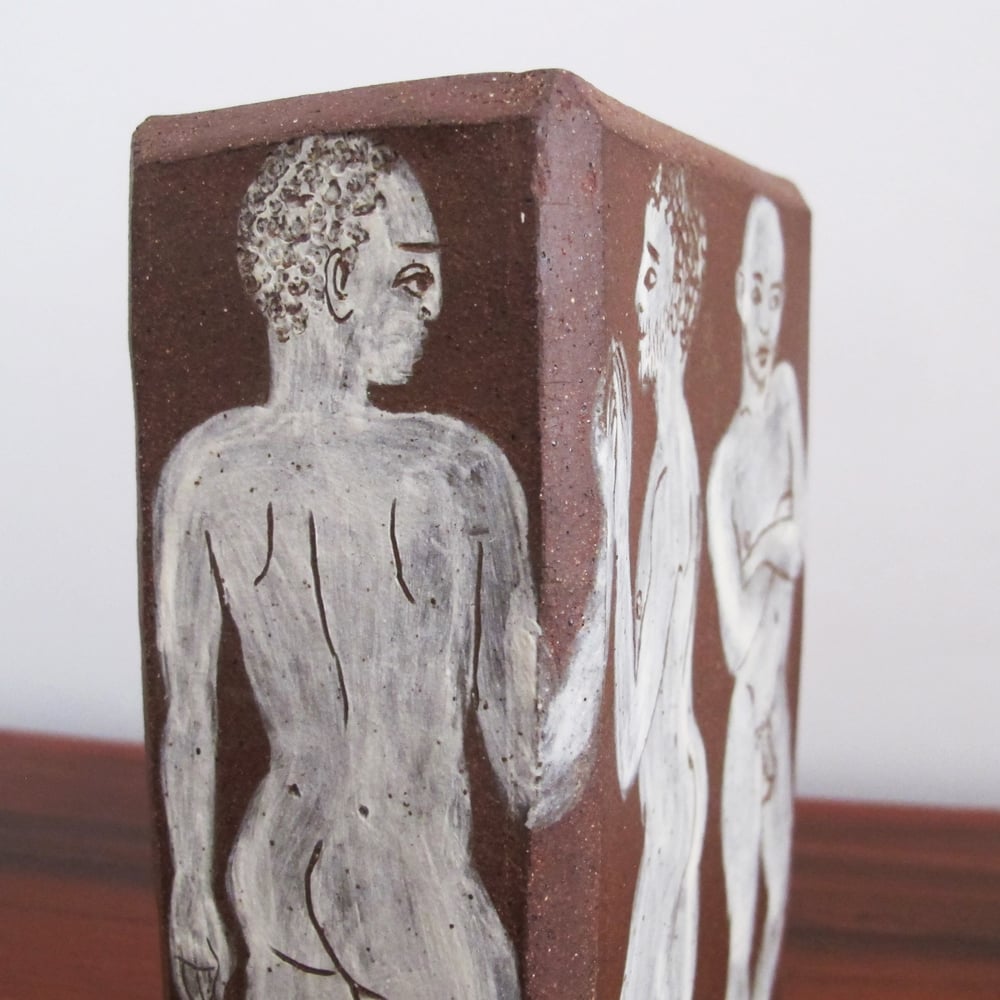 Naked men flower brick