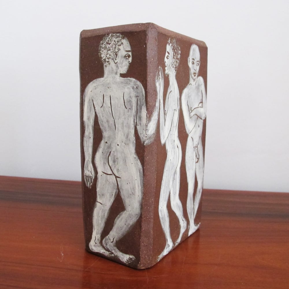 Naked men flower brick