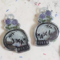 Image 1 of flowery skull earrings