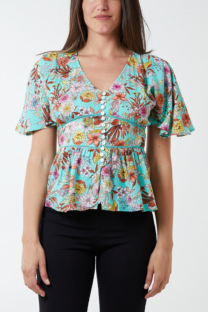 Image of Batwing Peplum Top