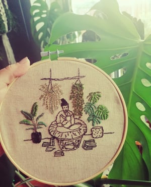 Embroidery hoop girl with her plants 