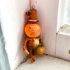 Frightened Pumpkin Headed Goblin in Top hat
