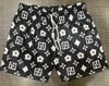 Rich and Rebellious floral mesh shorts