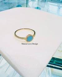 14k round turquoise with diamonds ring