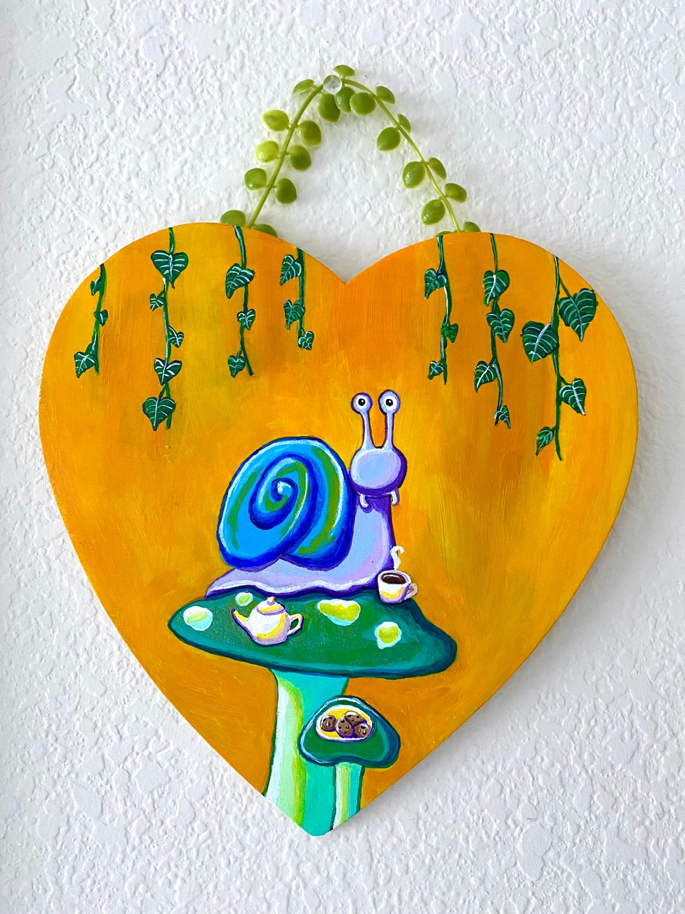 Image of "Tea Snail" Heart Shaped Painting