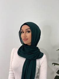 Minjarra modal hijab