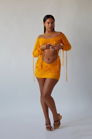 Image of yellow orange gathered knotted top
