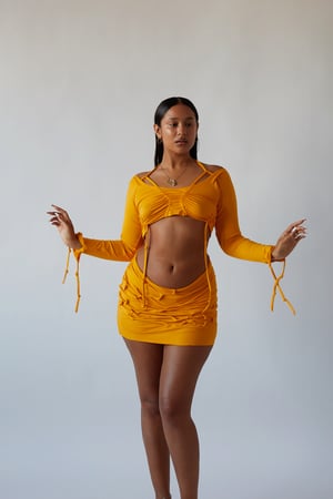 Image of yellow orange gathered knotted top