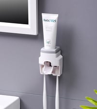 Image 1 of Toothbrush Holder Dispenser