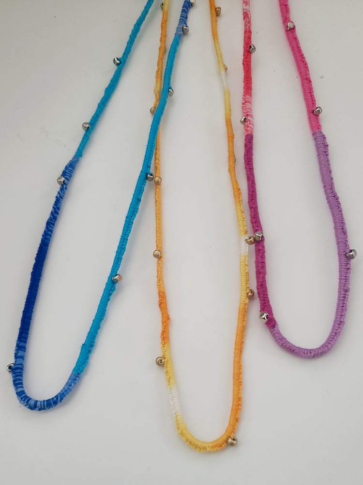 Image of rainbow macrame necklaces