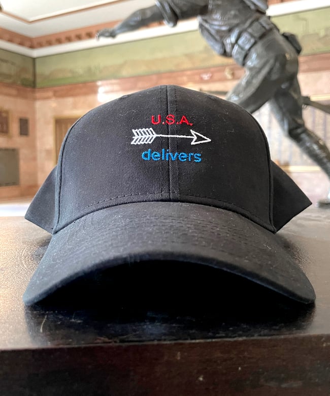 U.S.A. Delivers Cap