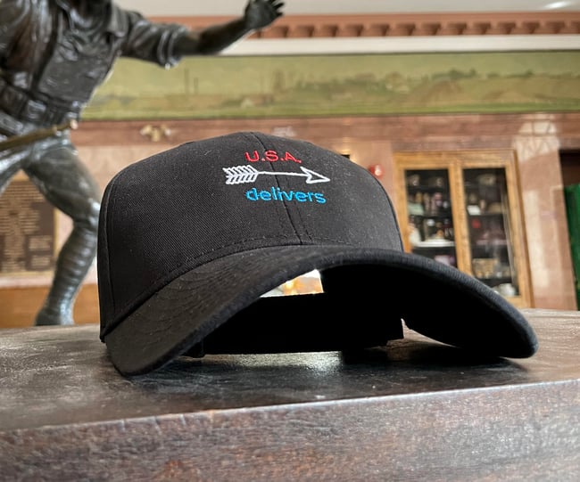 U.S.A. Delivers Cap