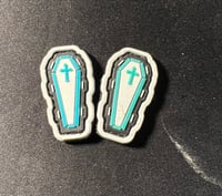 Teal and White Coffins