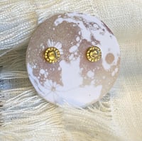 Gold sun stud earrings