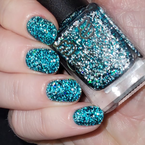 Image of Flight of fancy - a deep green base with reflective holo glitter& 3 sizes of  green holo glitter