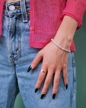 Image of La Petite Garnet Heart marquise cut silver ring
