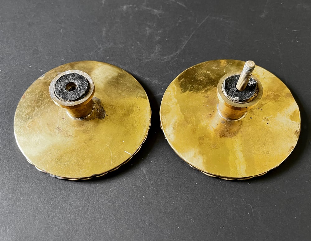 Image of Two Sets of Circular Push-Pull Handles with Hammered Texture
