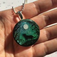 Image 3 of Wolf and Moon Northern Lights Round Resin Pendant