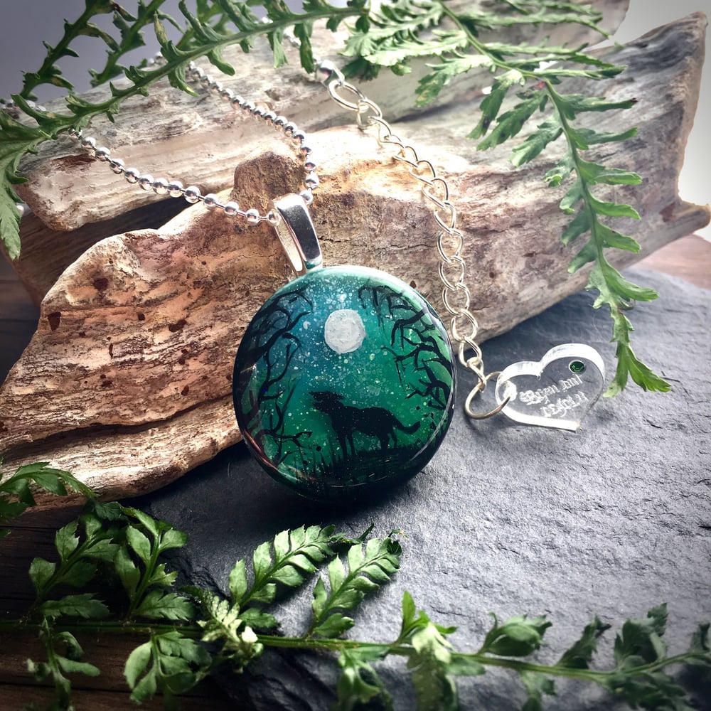 Wolf and Moon Northern Lights Round Resin Pendant