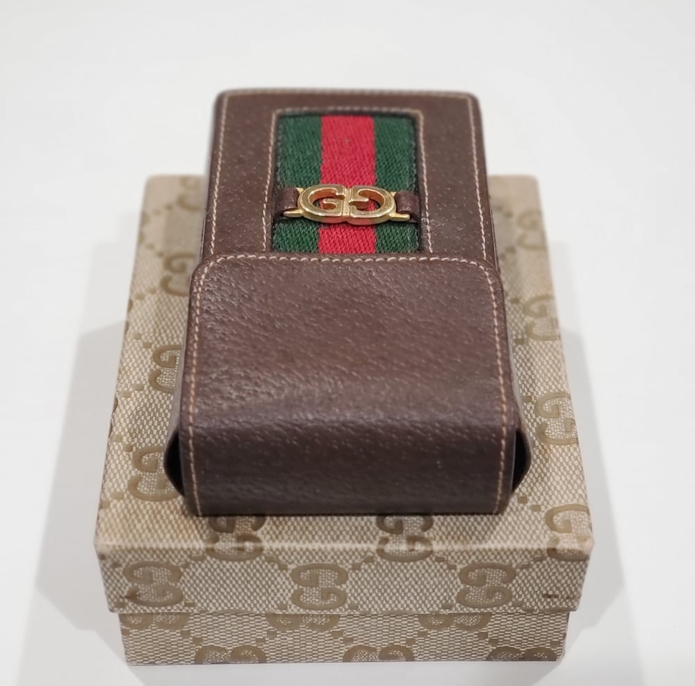 Sold at Auction: VINTAGE GUCCI EYEGLASS CASE AND CIGARETTE CASE