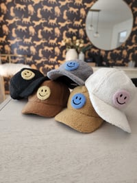 Image 1 of Sherpa smiley face hats