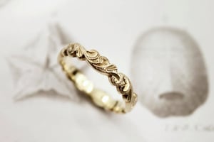 Image of 18ct gold 4mm floral carved ring