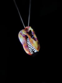 Image 4 of Silver haze T-Rex skull pendant. 