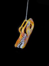 Image 4 of Mixed color alligator skull pendant.