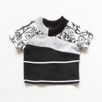 Image 1 of black and white patchwork flower boy kid unisex 12m baby short sleeve raglan tee tshirt top shirt