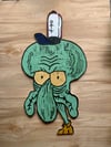 Angry Squidward meme carving