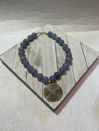 Image 1 of Fancy Glass with Circular Charm