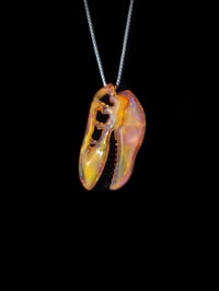 Image 3 of Jupiter v2 T-Rex skull pendant with galaxy teeth. 