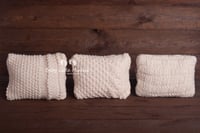 Image 1 of Knitted newborn pillow set 3