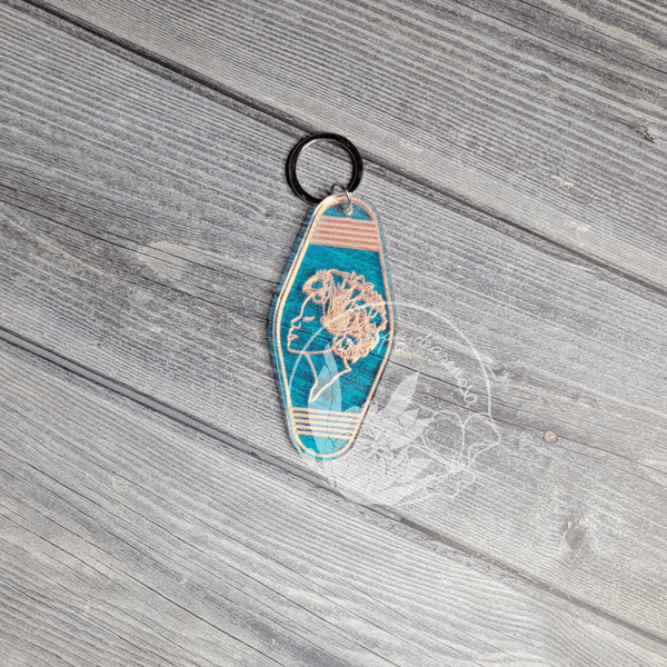 Image of She Blooms Iridescent Hotel Keychain