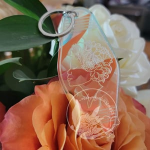 Image of She Blooms Iridescent Hotel Keychain