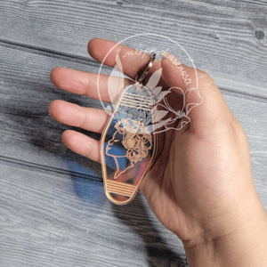 Image of She Blooms Iridescent Hotel Keychain