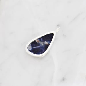 Image of 'Cosmic Lung' Sodalite cabochon cut mixed shape silver necklace no.1