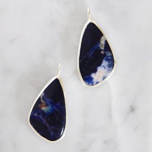 Image of 'Cosmic Lung' Sodalite cabochon cut mixed shape silver necklace no.1